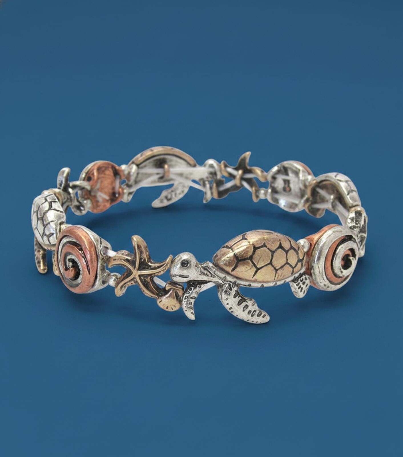 The Unbranded Brand Ocean-Themed Silver and Rose Gold Tone Turtle Bracelet Size ONE SIZE - 1 Preview