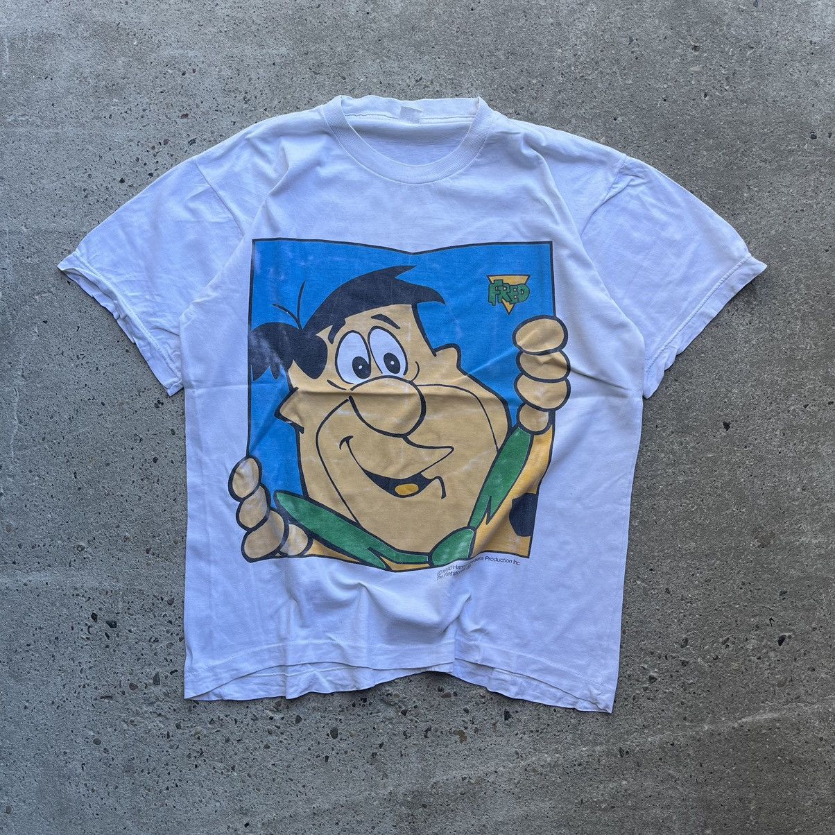 Image of 1990X Clothing x Cartoon Network 1990 The Flintstones Fred All Over Print Single Stitch Tee in Whit