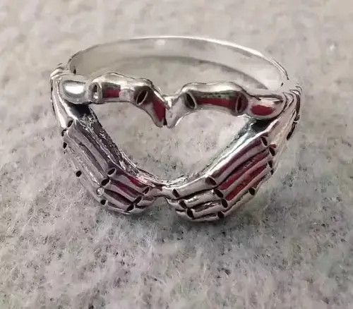 Jewelry Skull Hand With Heart-Shaped Ring Size ONE SIZE - 1 Thumbnail