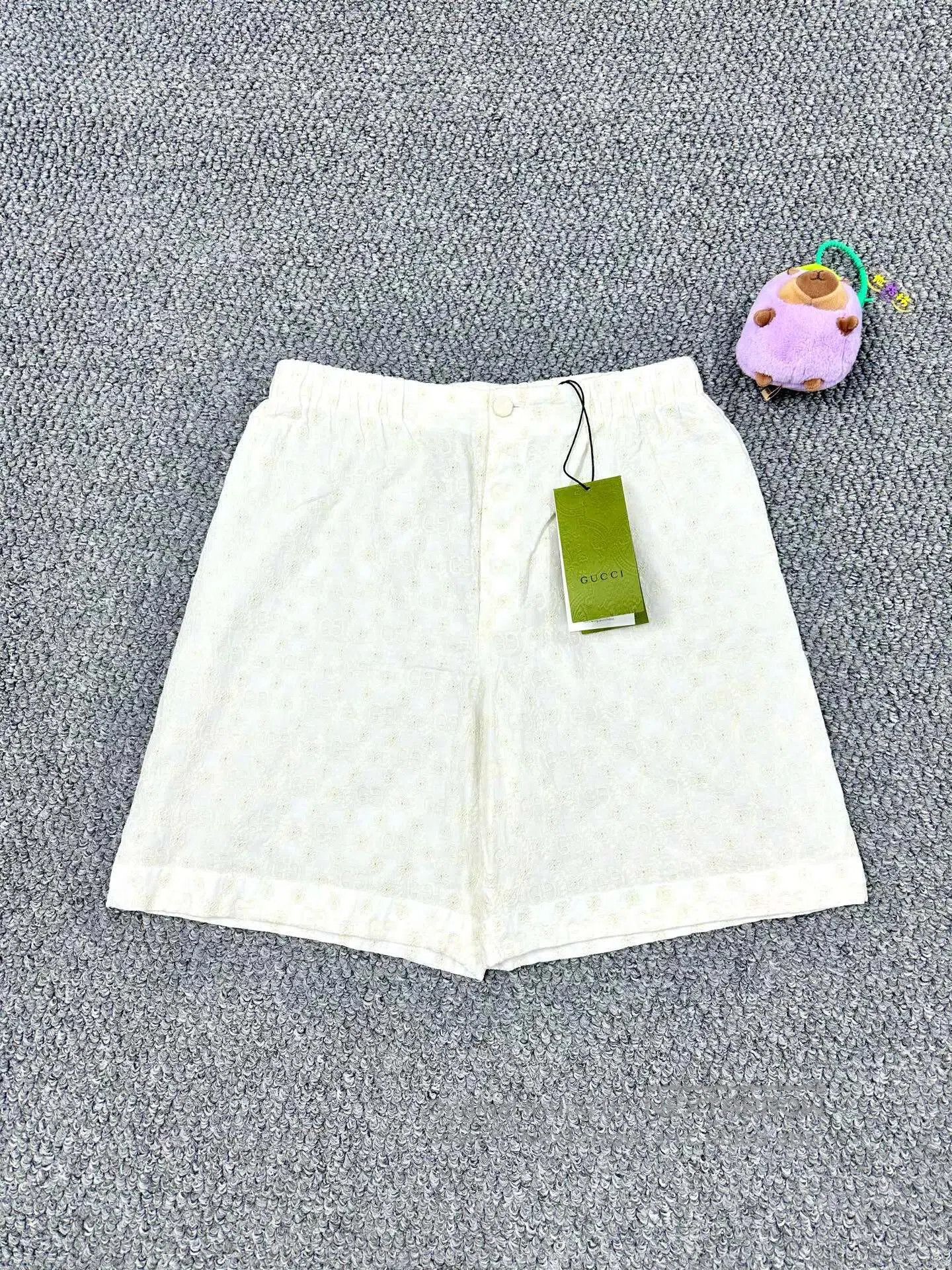 Gucci Guicci Ivory double G embossed logo print shorts| Size 37" - 1 Thumbnail