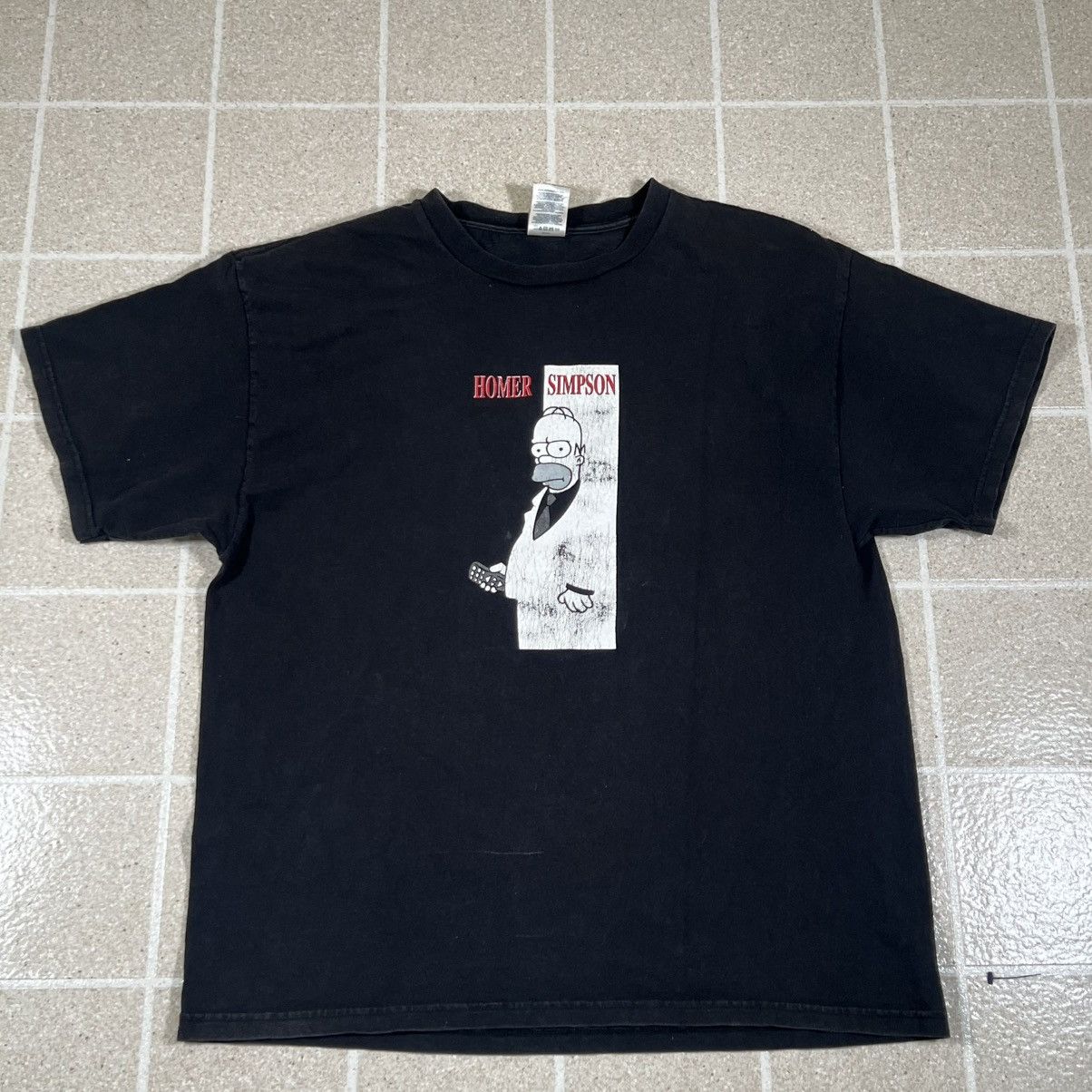 Delta Homer Simpson Scarface T-Shirt Black Remote The Simpsons Size US XL / EU 56 / 4 - 1 Thumbnail