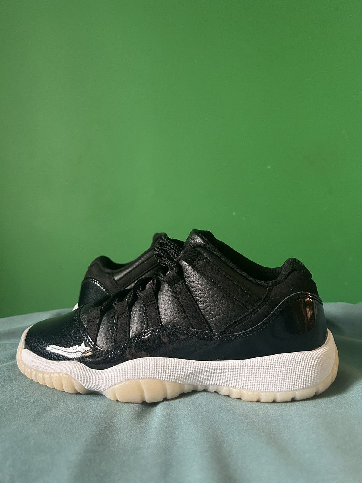 image of Nike Air Jordan 11 Low 72-10 2022 Shoes in Black, Men's (Size 5)
