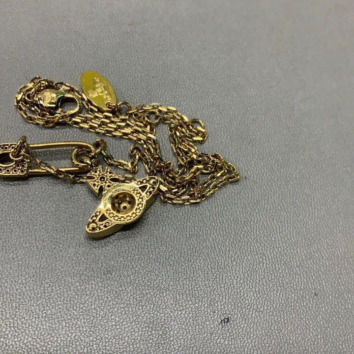 Vivienne Westwood Vivienne Westwood Gold Safety Pin Saturn Pendant Necklace Size ONE SIZE - 5 Thumbnail