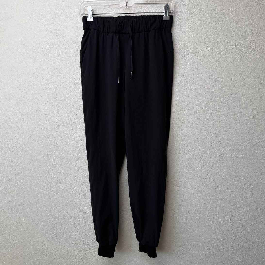 Lululemon Lululemon On The Fly Jogger Black Drawstring Cuffed Pants 2 Size 26" / US 2 / IT 38 - 1 Thumbnail