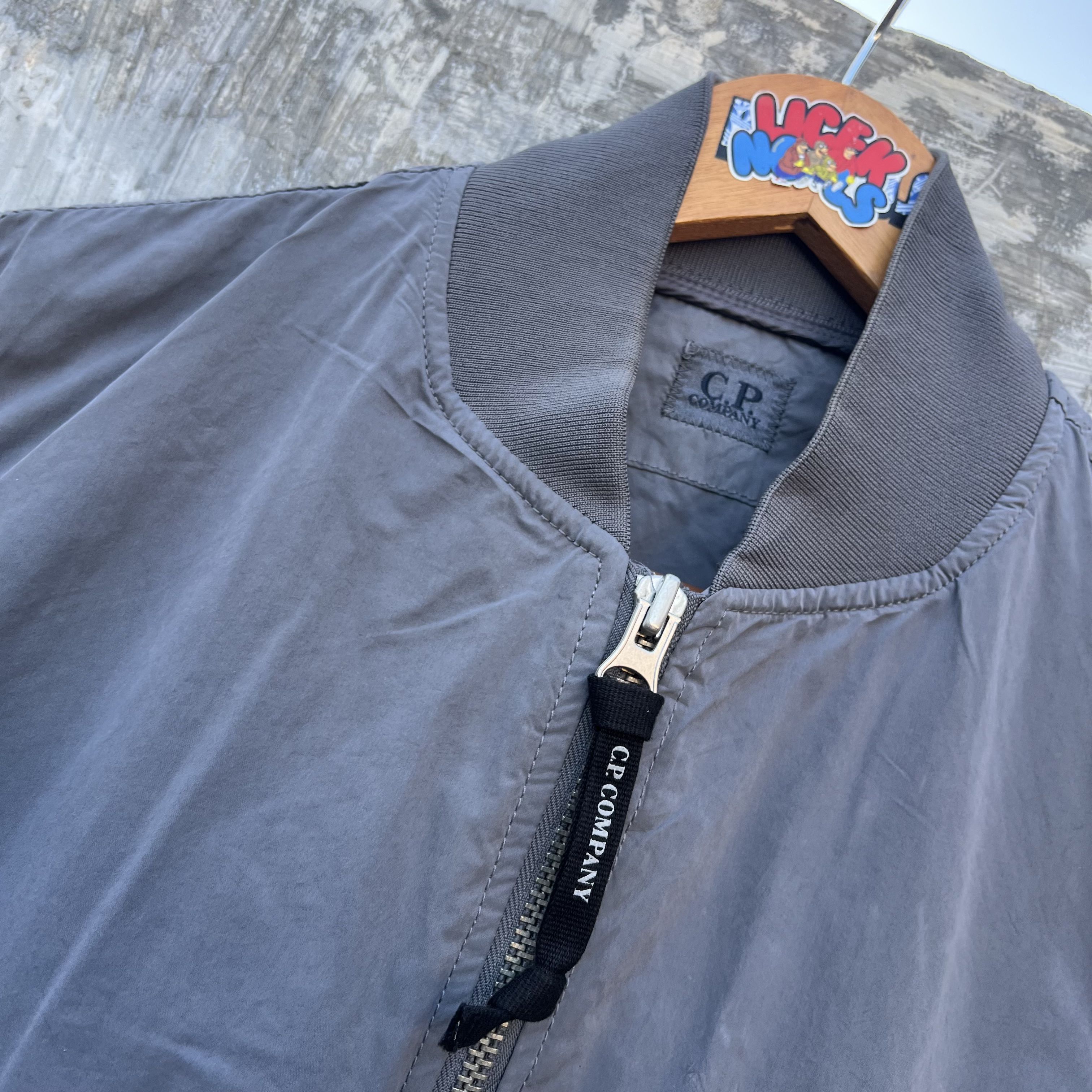 C.P. Company CP company arm lens Long bomber Size US M / EU 48-50 / 2 - 6 Thumbnail