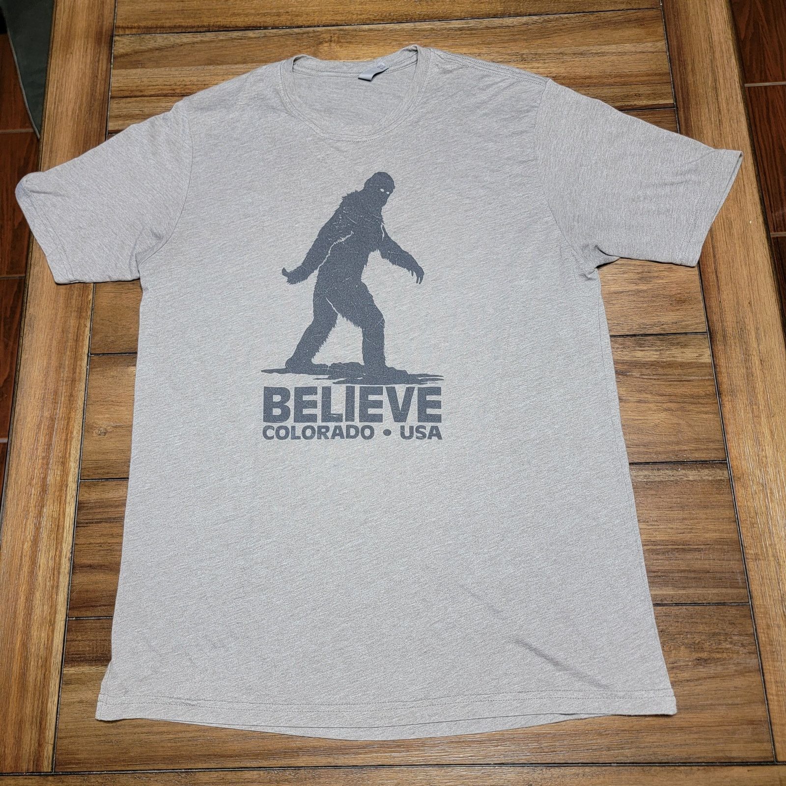 Next Level Apparel Bigfoot Believe Colorado USA Grey Unisex Tee (NLA) -Size XL* Size US XL / EU 56 / 4 - 1 Thumbnail