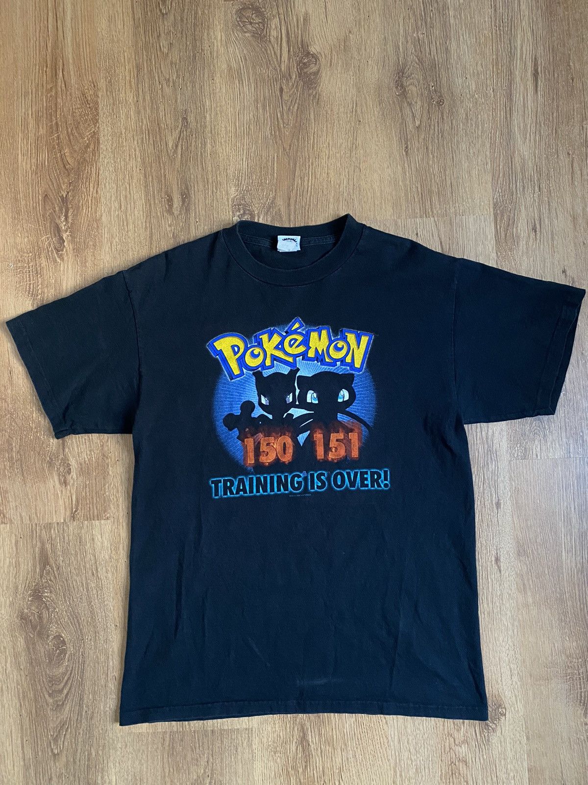 image of Nintendo x Pokemon Vintage 1999 Pokemon Mewtwo Training Is Over Tee in Black, Men's (Size XL)