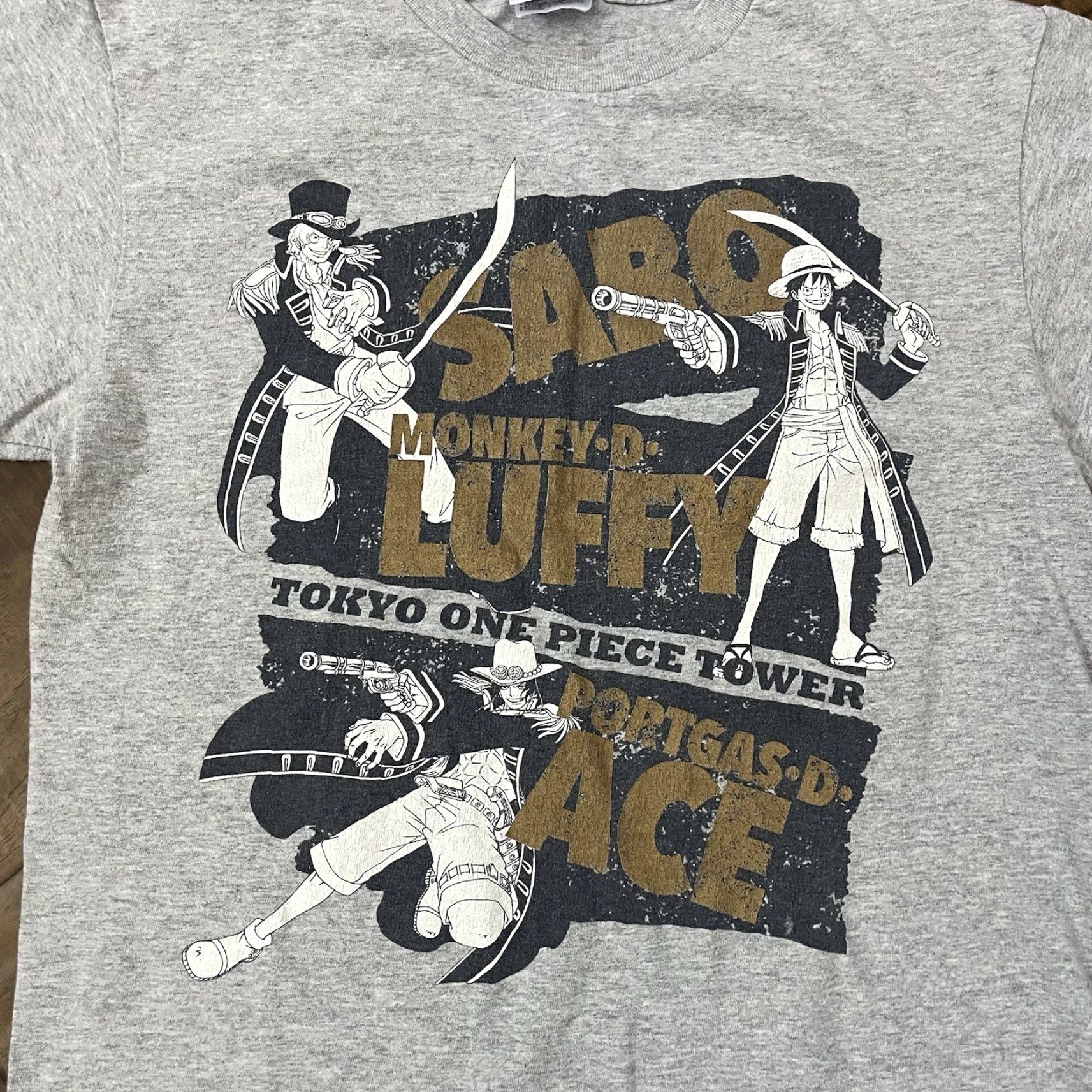 Vintage VINTAGE One Piece Shirt Men S Gray Short Sleeve Tokyo Tower Treasure Bag Big Pirate JPN Mugiwara Store Limited Anime Fan Merch Mens Size US S / EU 44-46 / 1 - 4 Thumbnail