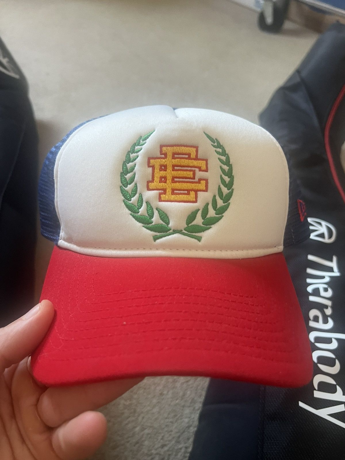 Eric Emanuel x New Era blue trucker snapback hat