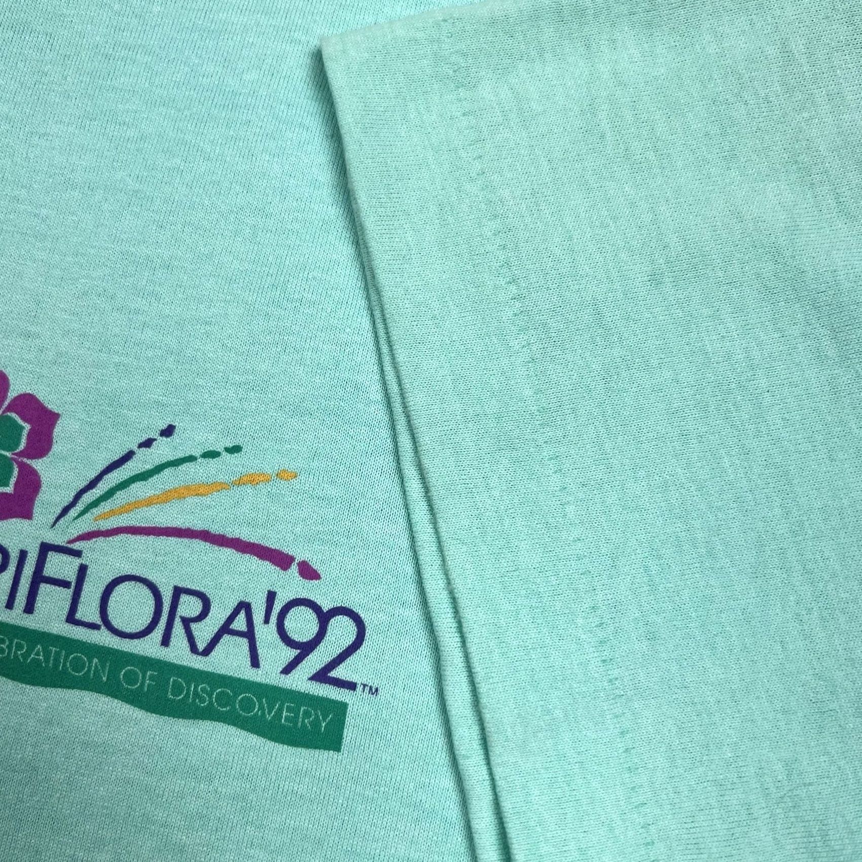Vintage VINTAGE AmeriFlora’92 Iris Flower Graphic Shirt XL Teal Unisex Adults 90s Floral Screen Stars Best T-Shirt Size US XL / EU 56 / 4 - 5 Thumbnail