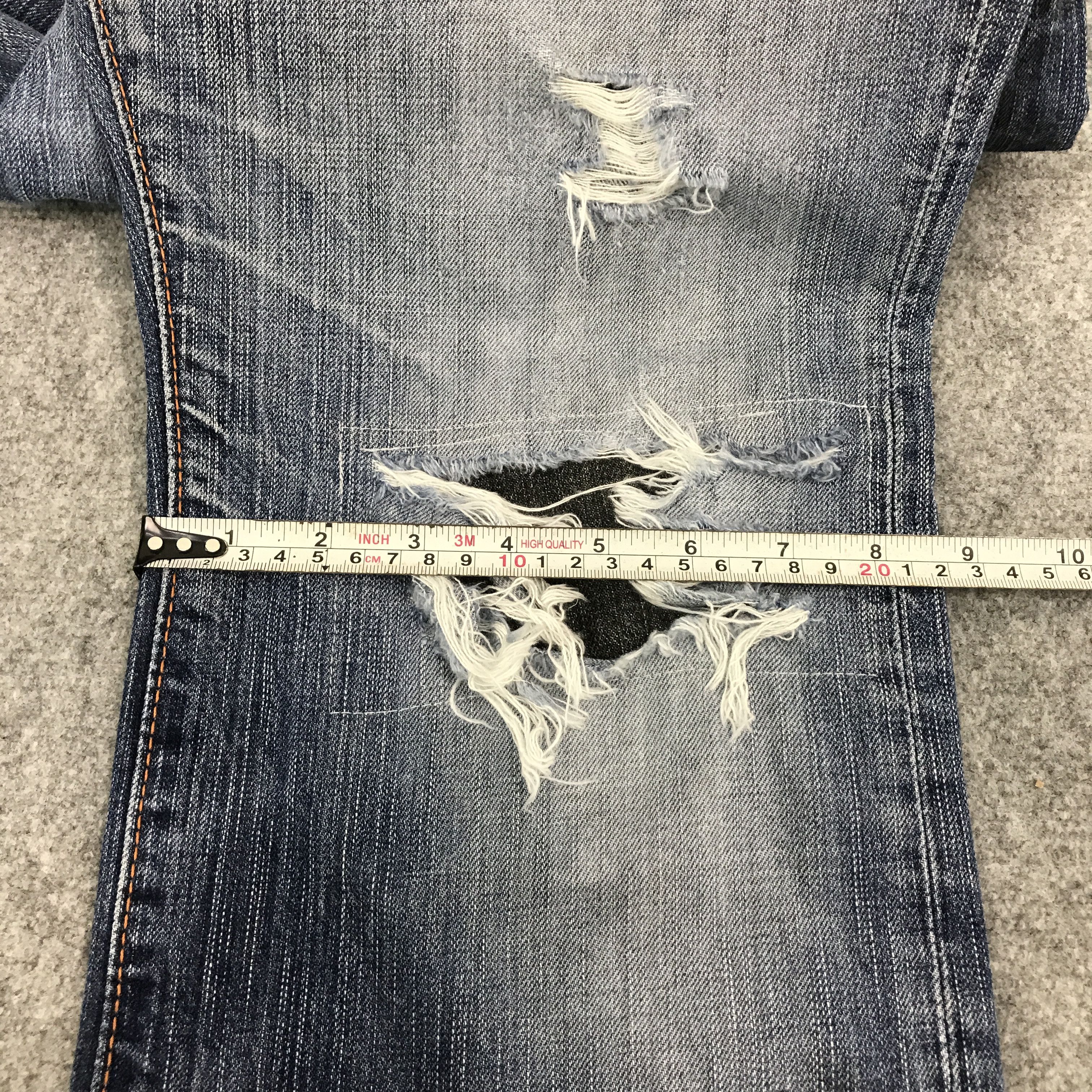 Edwin FLARE SNAKE DESIGN EDWIN DISTRESSED PATCHWORK BOOTCUT PANTS Size US 32 / EU 48 - 12 Thumbnail