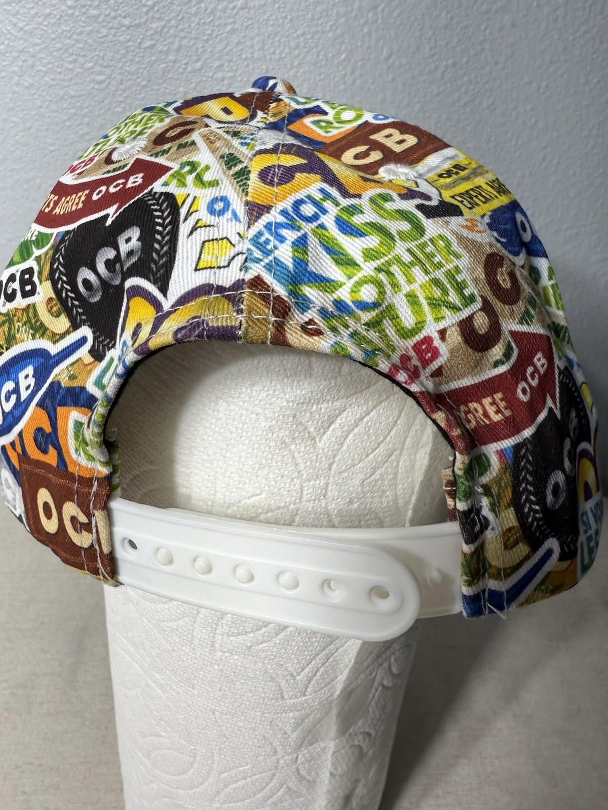 The Unbranded Brand OCB Collage Snap Back Baseball Cap – Size ONE SIZE - 8 Thumbnail