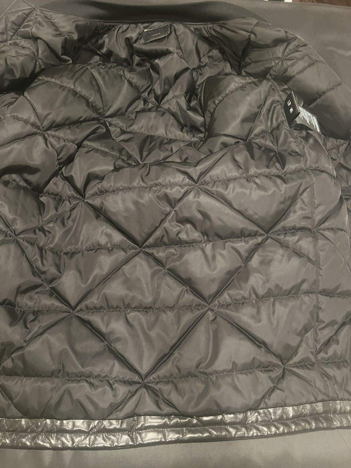 Prada Prada raf simons triangle leather jacket. S. $12500 Size US S / EU 44-46 / 1 - 2 Thumbnail