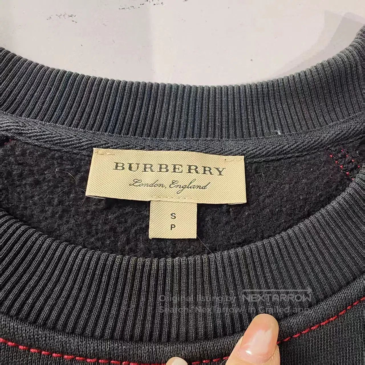 burberry sweatshirt in size small, navy blue.