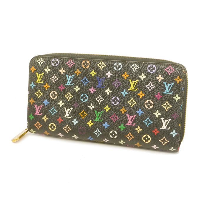 Louis Vuitton Emilie Wallet did not quite fit my passport and