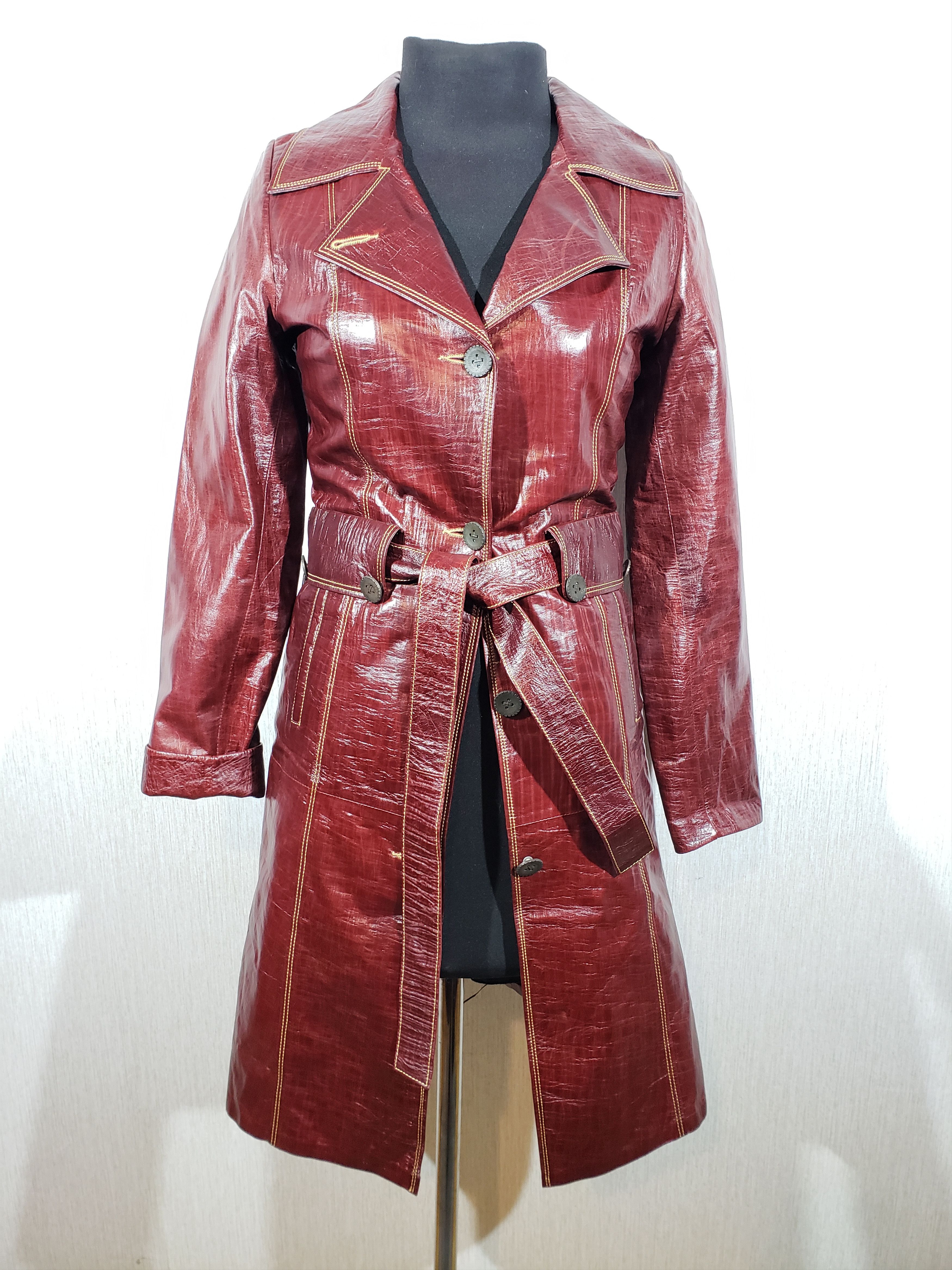 Brown women's coat made of genuine leather.
