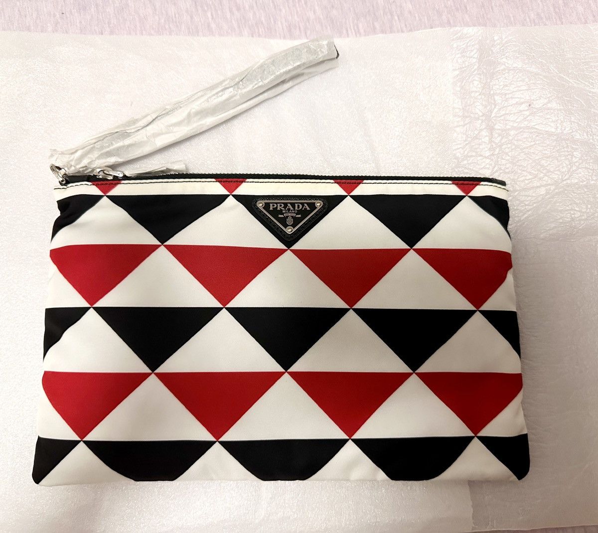image of Prada Abstract Printed Pouch Handbag in Red, Women's