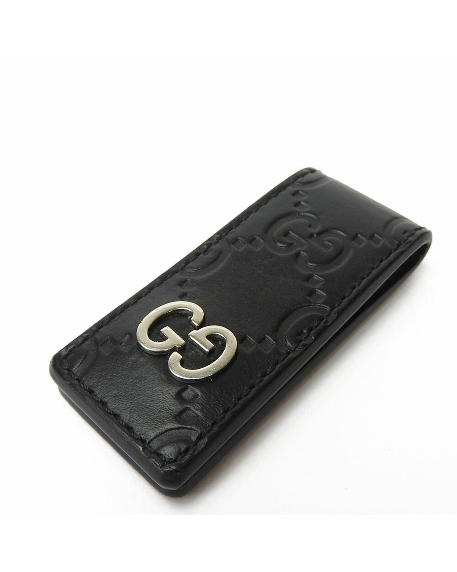 image of Gucci Sleek Leather Money Clip With Iconic Pattern in Black, Men's