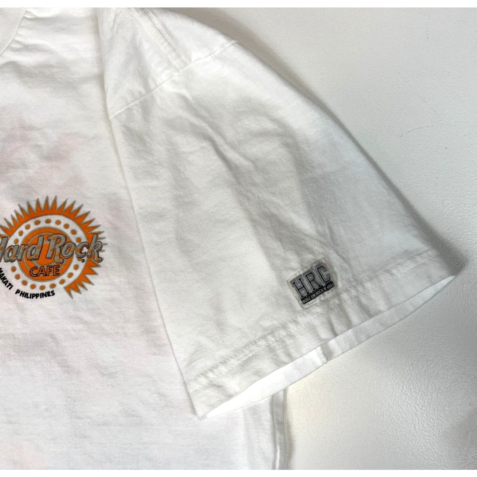 Hard Rock Cafe VINTAGE Hard Rock Cafe Makati Phillipines T-Shirt Unisex Adults Size M White Cotton Graphic Short Sleeve Crew Neck 2000-2009 Rock 90s (optional) Size US M / EU 48-50 / 2 - 6 Thumbnail