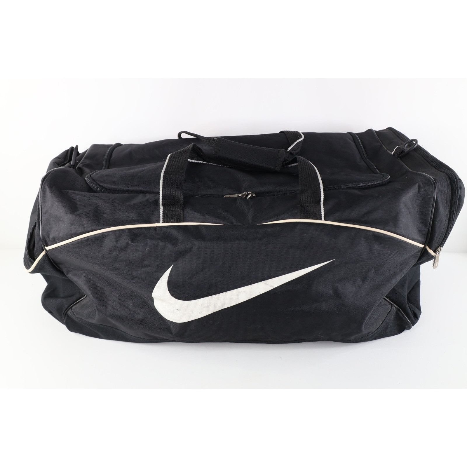nike black and mint backpack with white logo RPM The Nike Heritage Eugene Backpack combines clean everyday style with practical organization Nike 3 Brand Graphic Print
