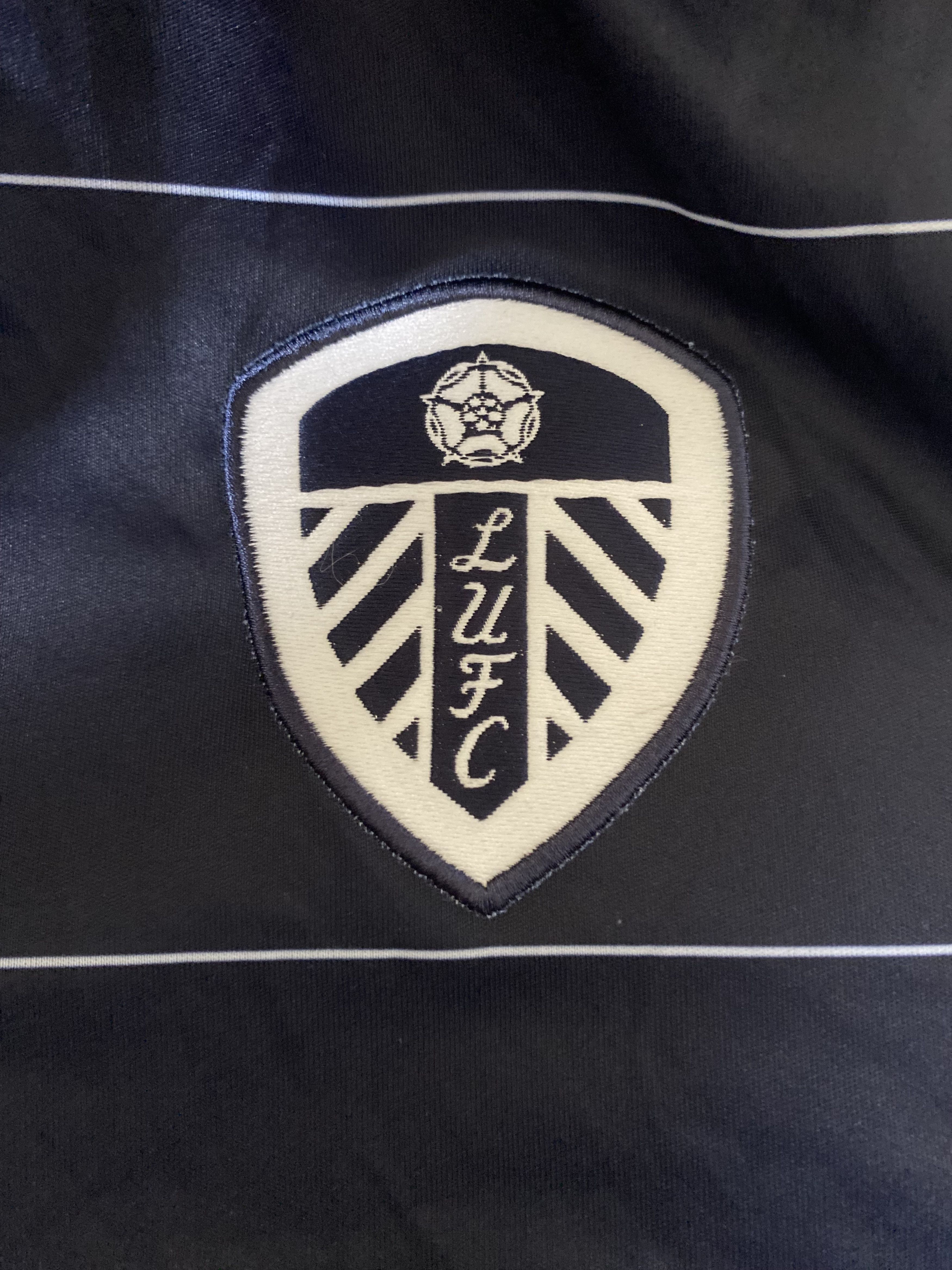 Macron LEEDS UNITED F.C. 2014 - 2015 - Macron - XL - UNIQUE Size US XL / EU 56 / 4 - 7 Thumbnail