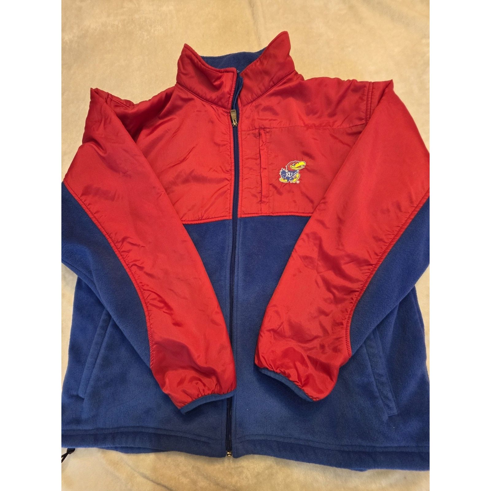 Majestic Kansas Jayhawks fleece jacket is a Majestic brand product Size US XL / EU 56 / 4 - 1 Thumbnail