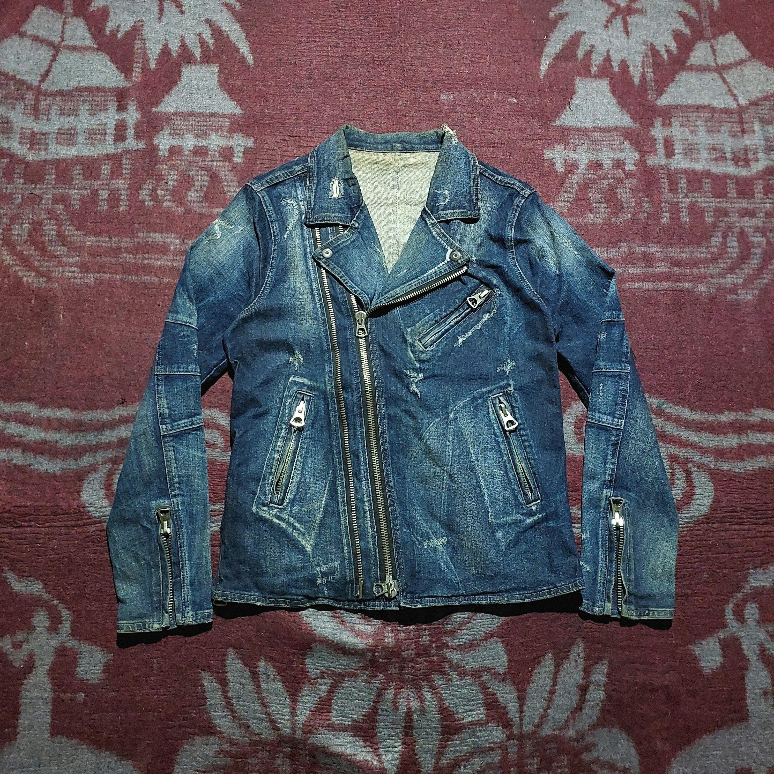 semantic design asymmetric zipper distressed denim jacket