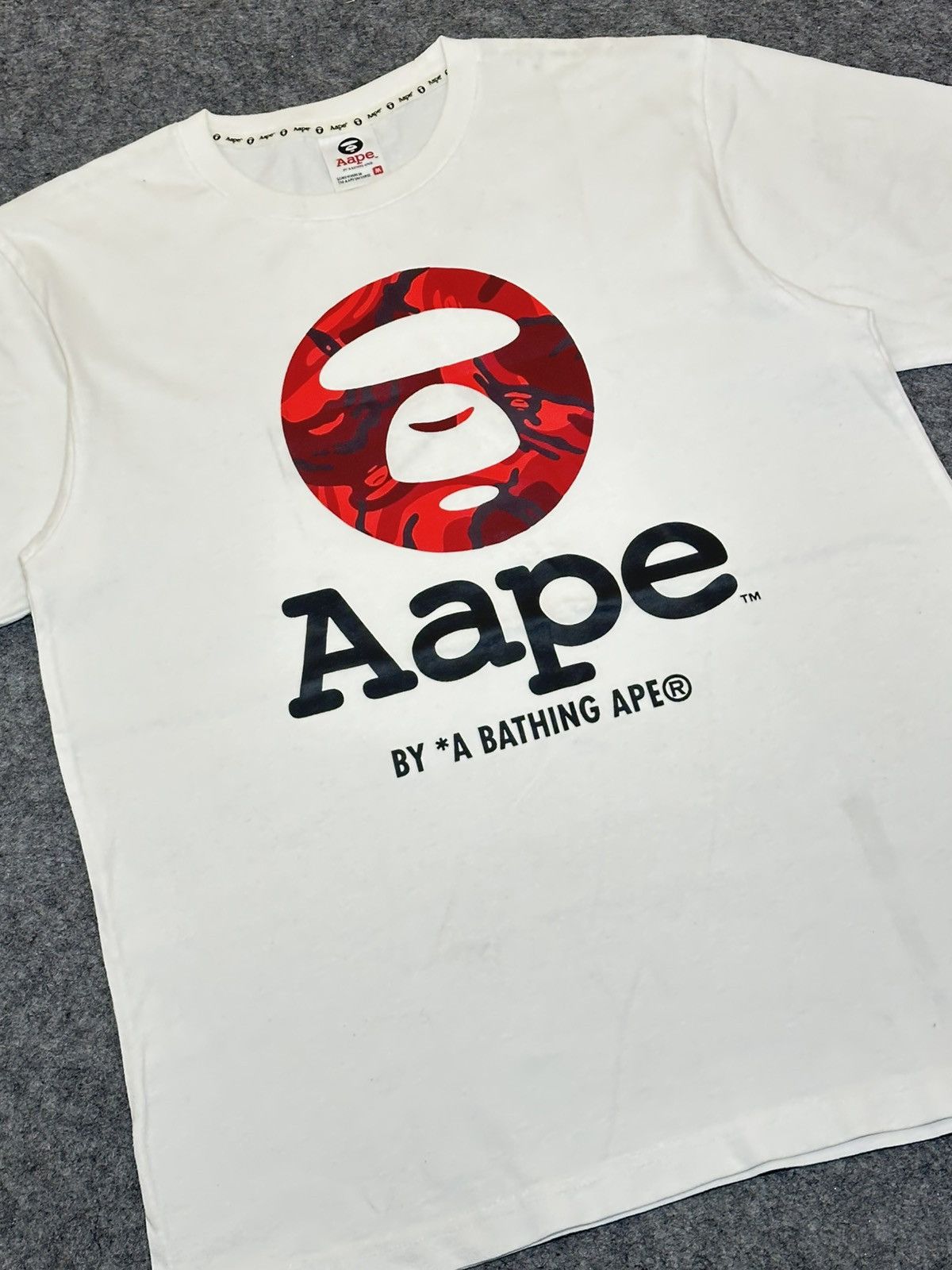 Aape AAPE by A Bathing Ape Moon Face Camo T-shirt in white. Size US M / EU 48-50 / 2 - 2 Thumbnail