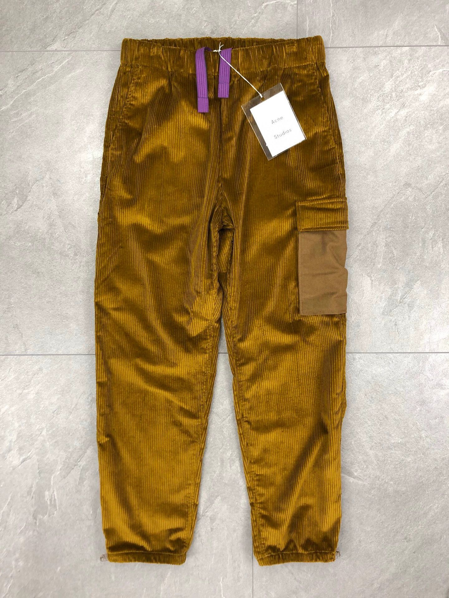 brown corduroy casual pants by Acne Studios