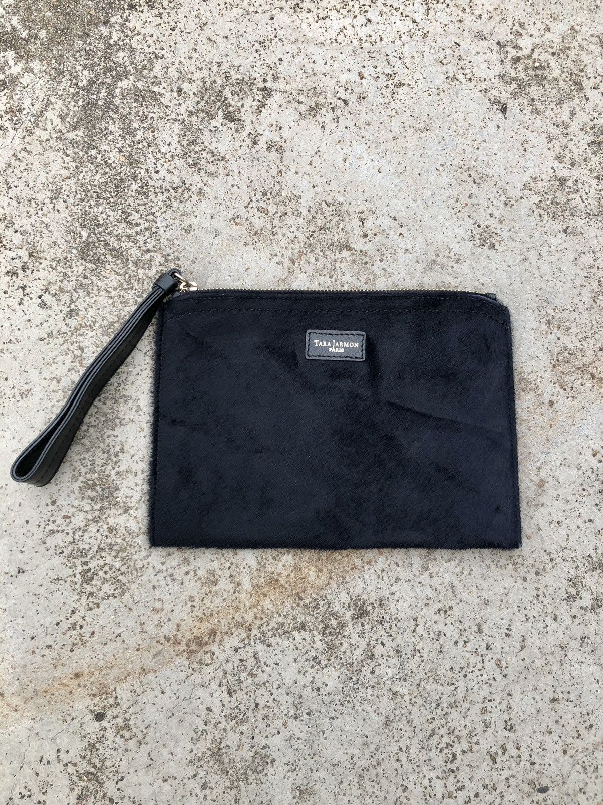 LEATHER CLUTCHBAG BY TARA JARMON PARIS