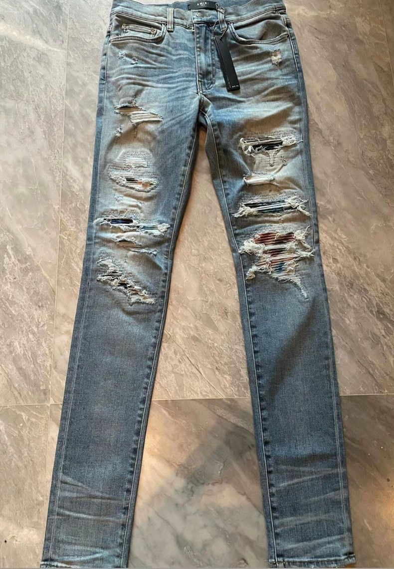 Amiri Amiri rendered distressed patched blue jeans Size US 31 - 1 Thumbnail