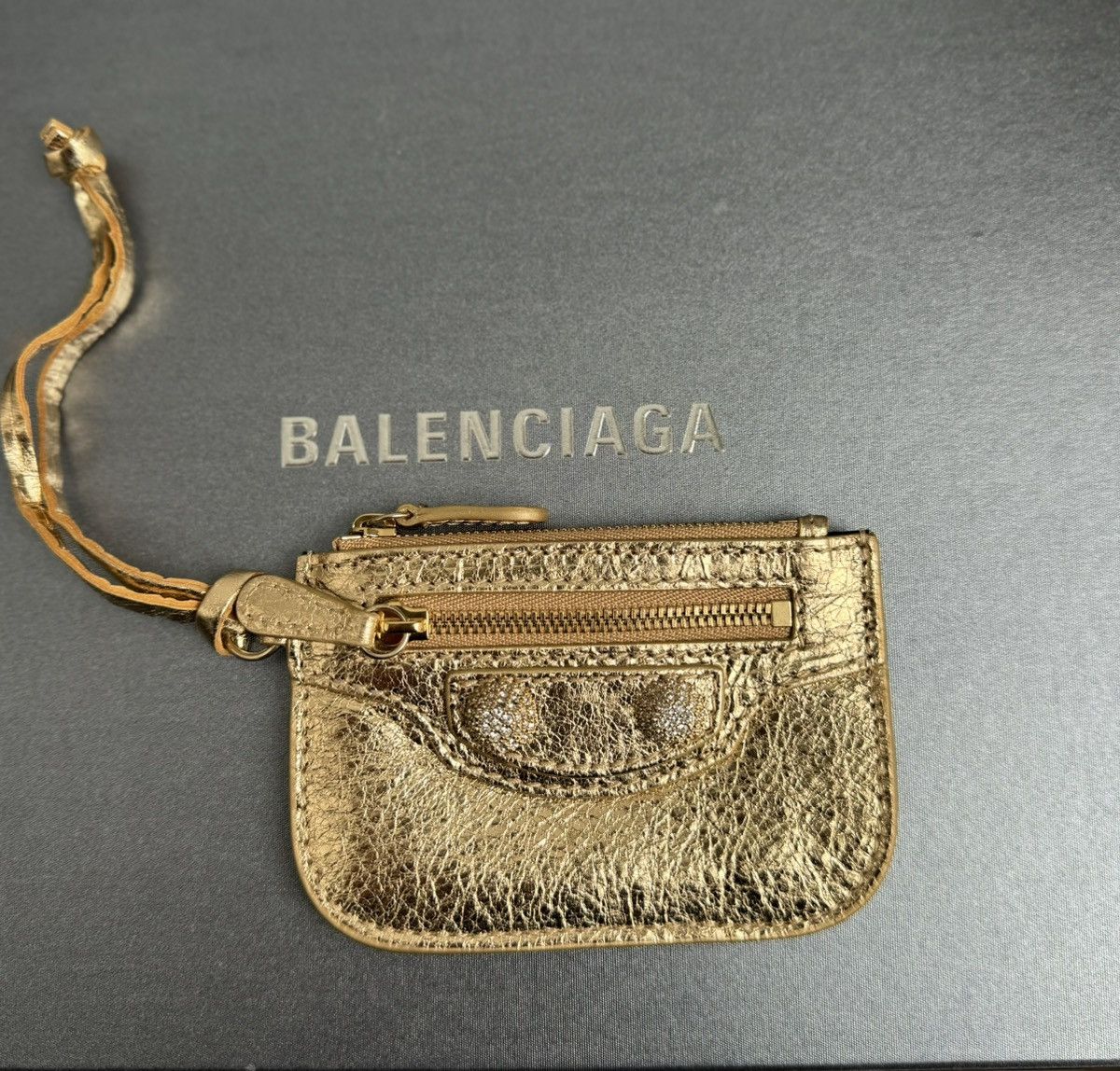 image of Pouch/wallet Balenciaga Bag Cagole Rhinestones in Gold, Women's