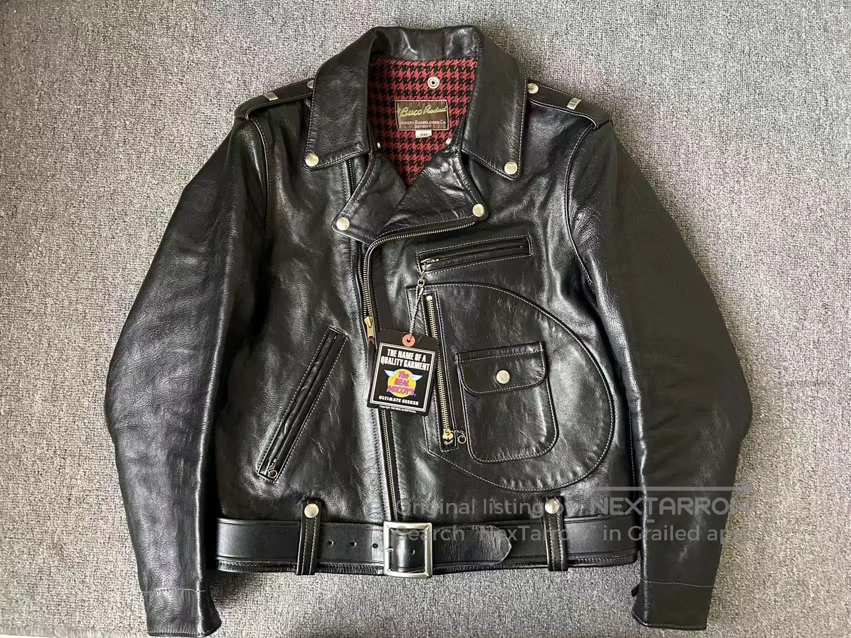 The Real McCoy's black leather motorcycle jacket with houndstooth lining. Size US S / EU 44-46 / 1 - 1 Thumbnail