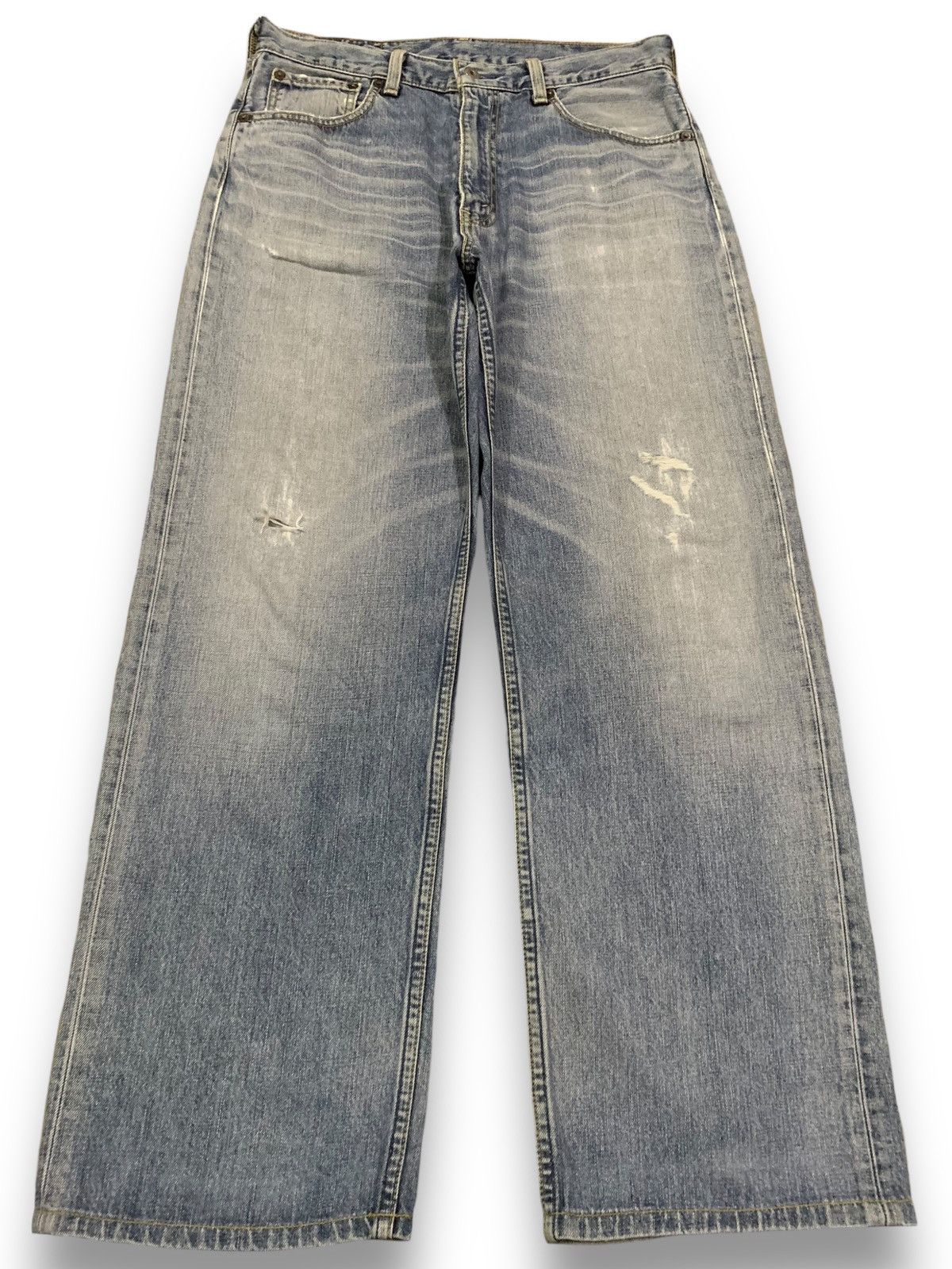 image of 1990X Clothing x Levis Vintage 90's Levis 504 Baggy High Waisted Distressed Jeans in Blue (Size 31)
