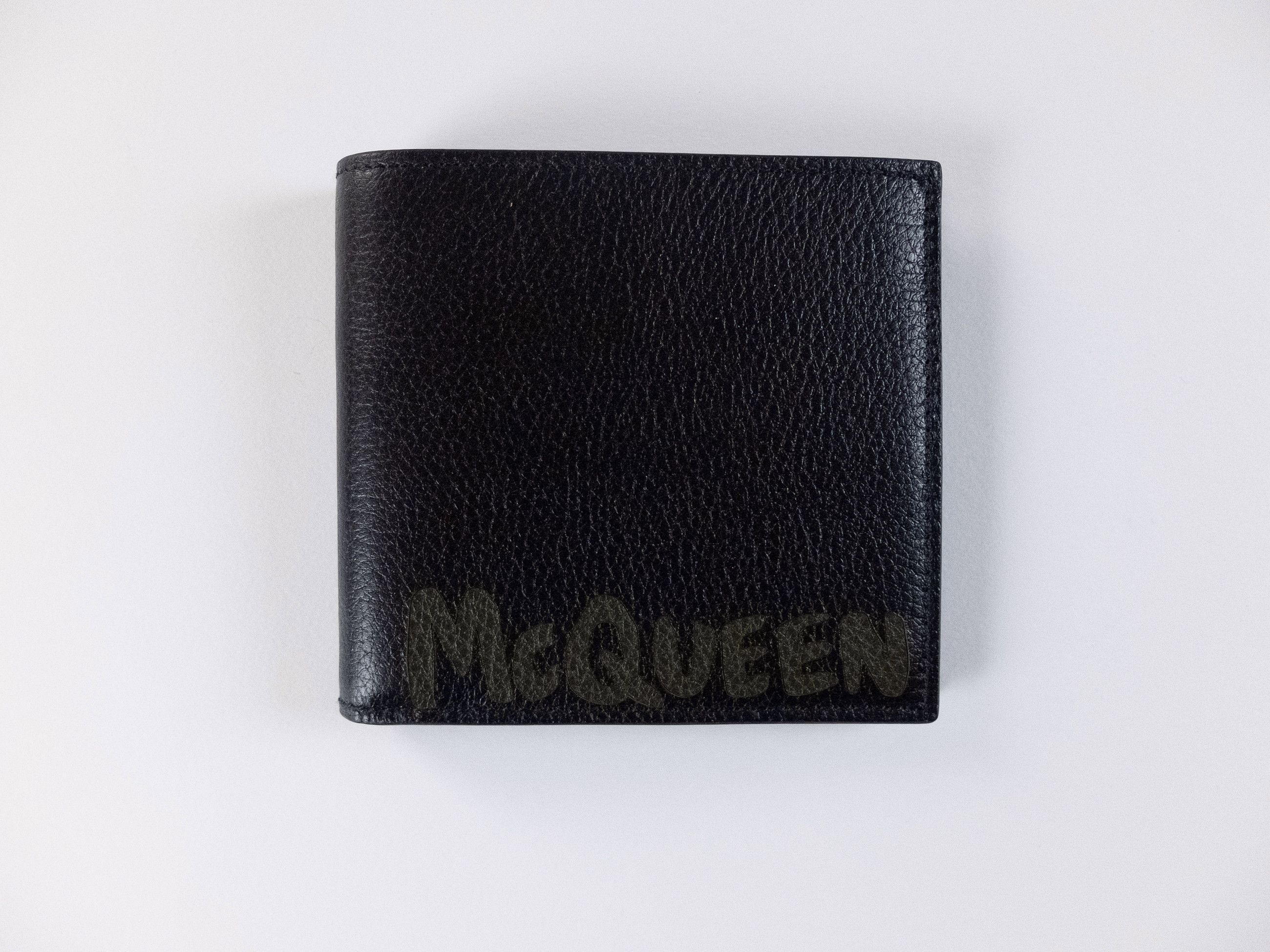 Alexander McQueen ALEXANDER MCQUEEN black graffiti logo leather bifold wallet Size ONE SIZE - 1 Thumbnail