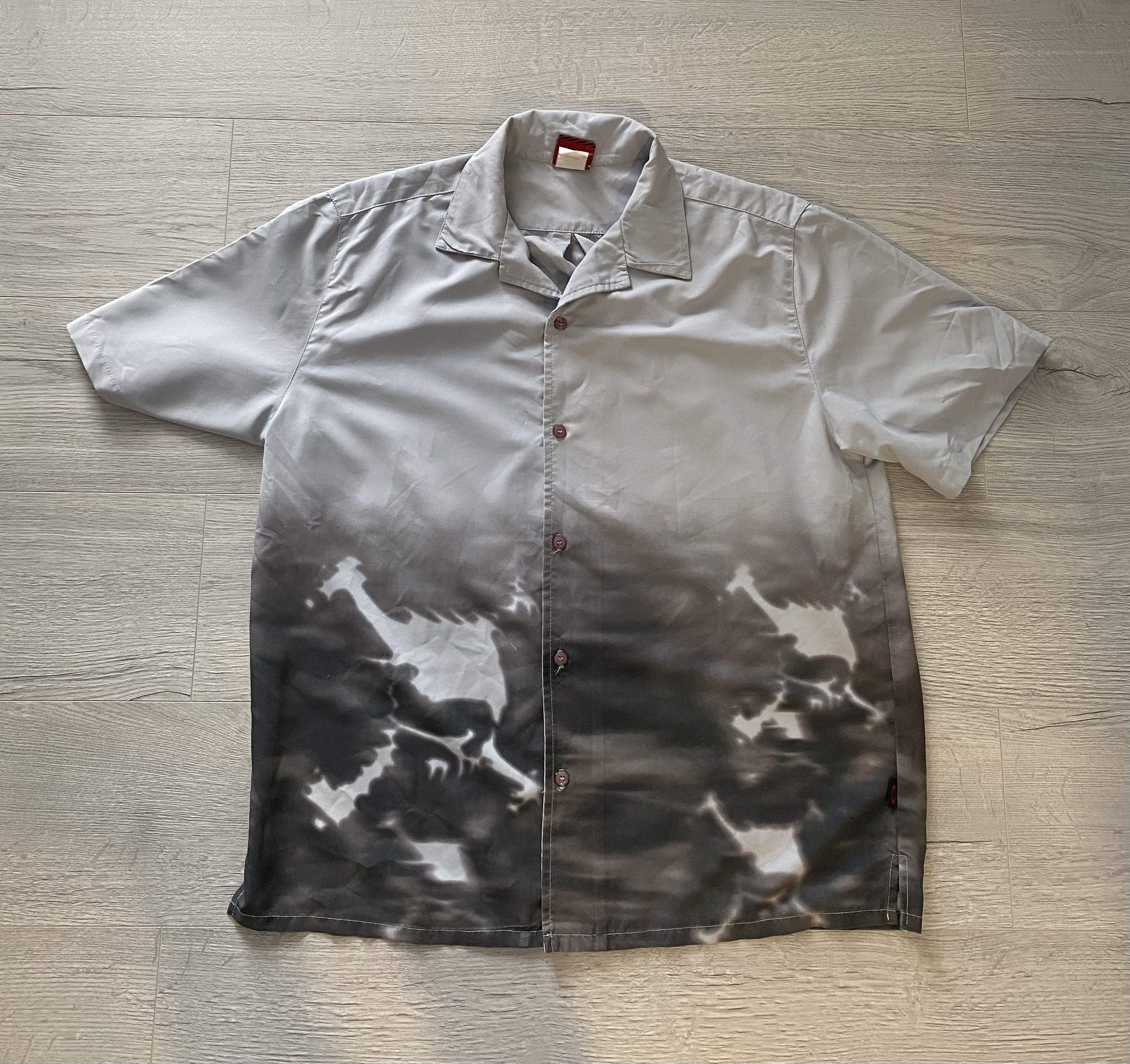 image of Made In USA x Oakley Vintage Oakley Blurred Skull Short Sleeve Shirt in Grey/Blue (Size Large)