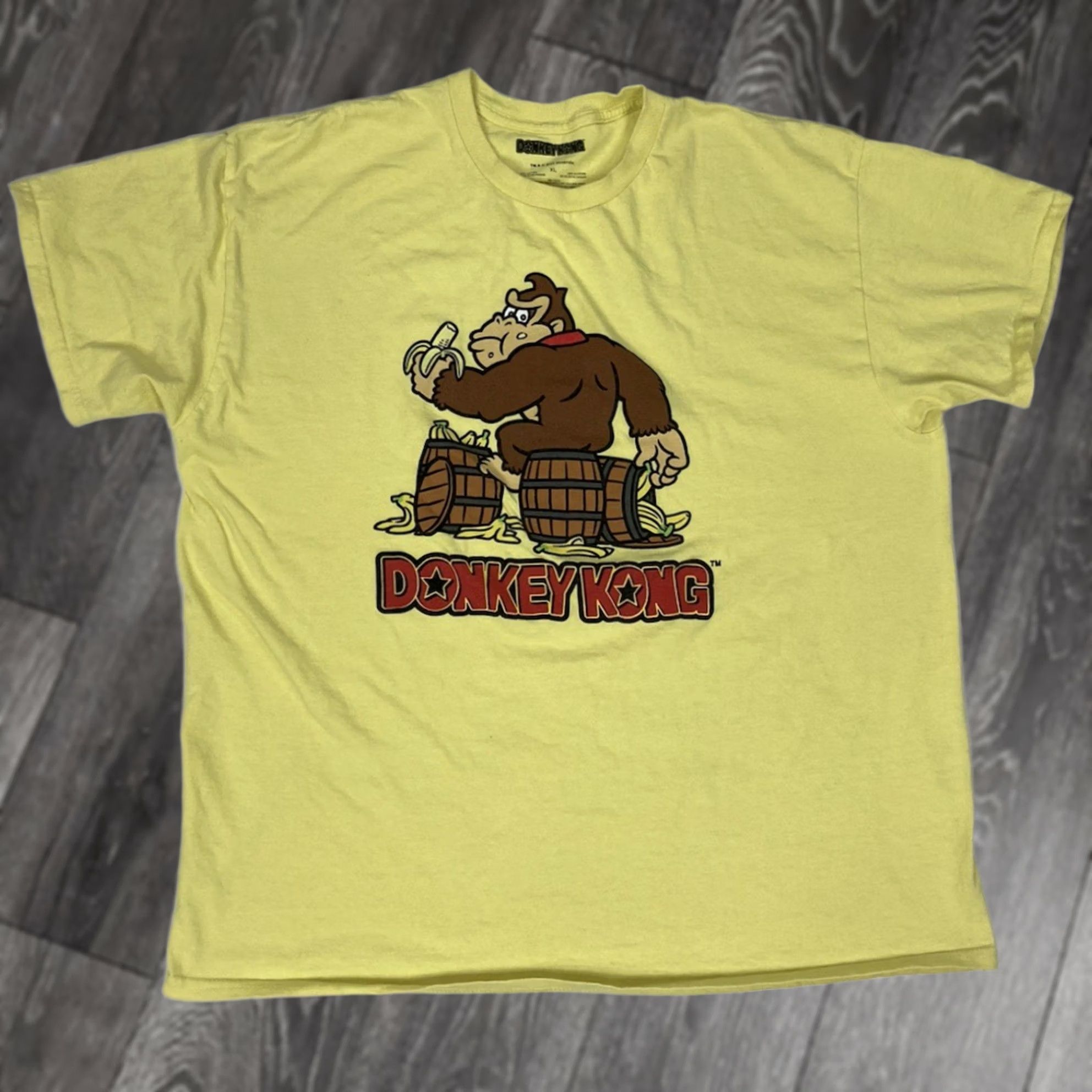 Nintendo VINTAGE Nintendo Donkey Kong Retro Graphic Shirt Men XL Yellow Short Sleeve Size US XL / EU 56 / 4 - 1 Thumbnail