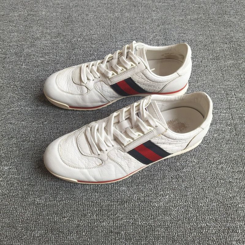 Gucci Gucci GG-Embossed Leather Canvas Sneakers 0079 Size US 8 / EU 41 - 1 Thumbnail