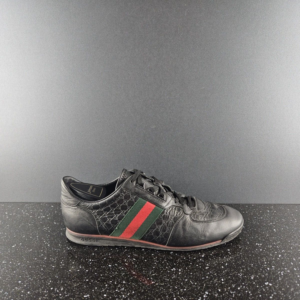 image of Gucci GG Guccissima Leather Sneakers (Y0110) in Black, Men's