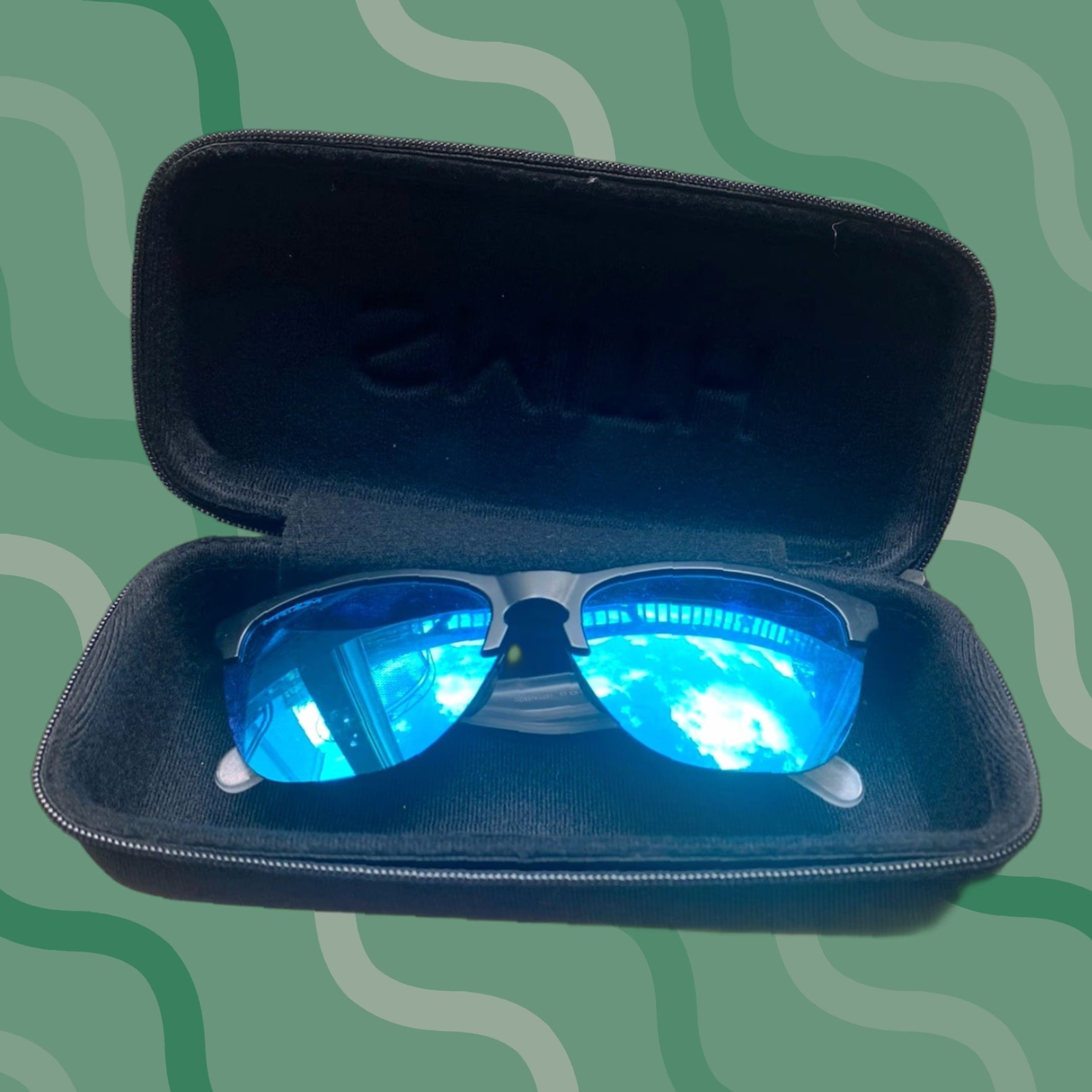Oakley Oakley Frogskins Sunglasses Unisex Adults Clear/Black Frame Prizm Sapphire Blue Reflective Lenses Size ONE SIZE - 1 Thumbnail