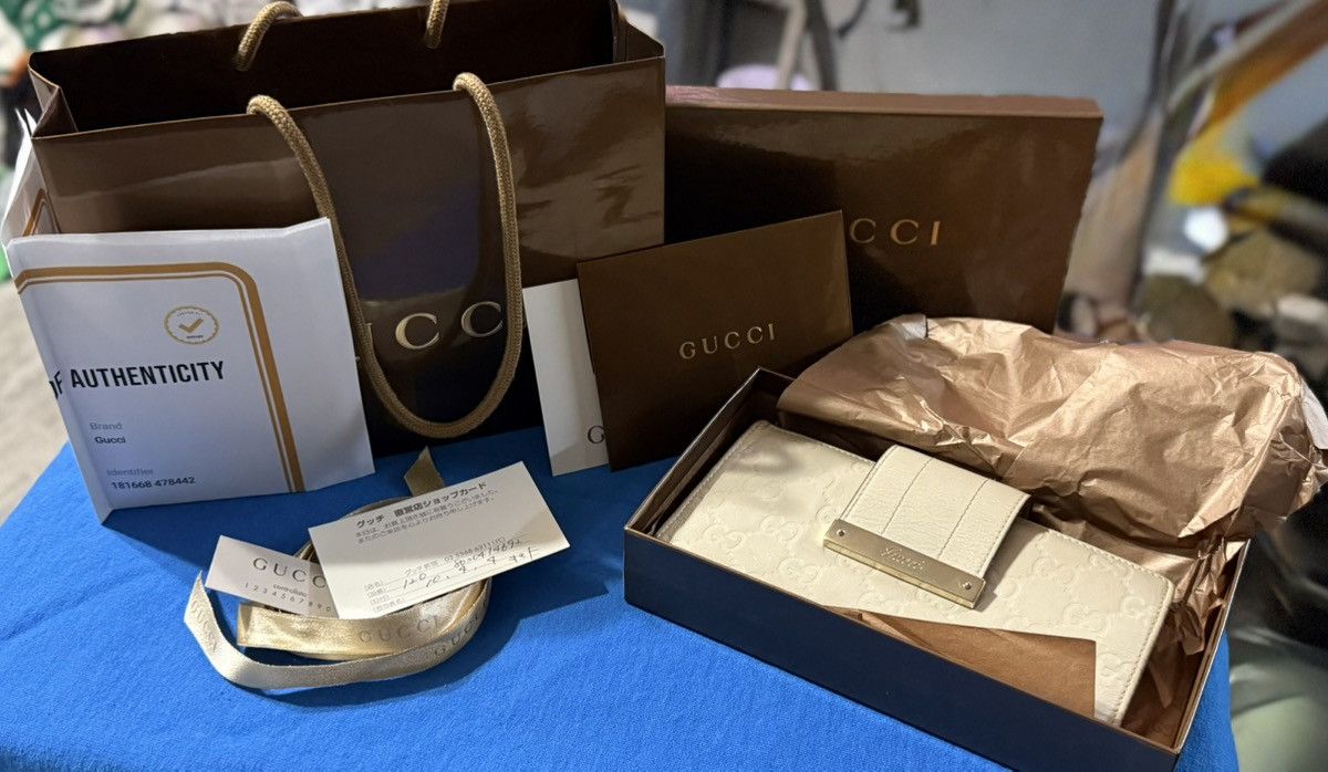 Gucci Ivory Leather GG Guccissima Snap Closure Wallet