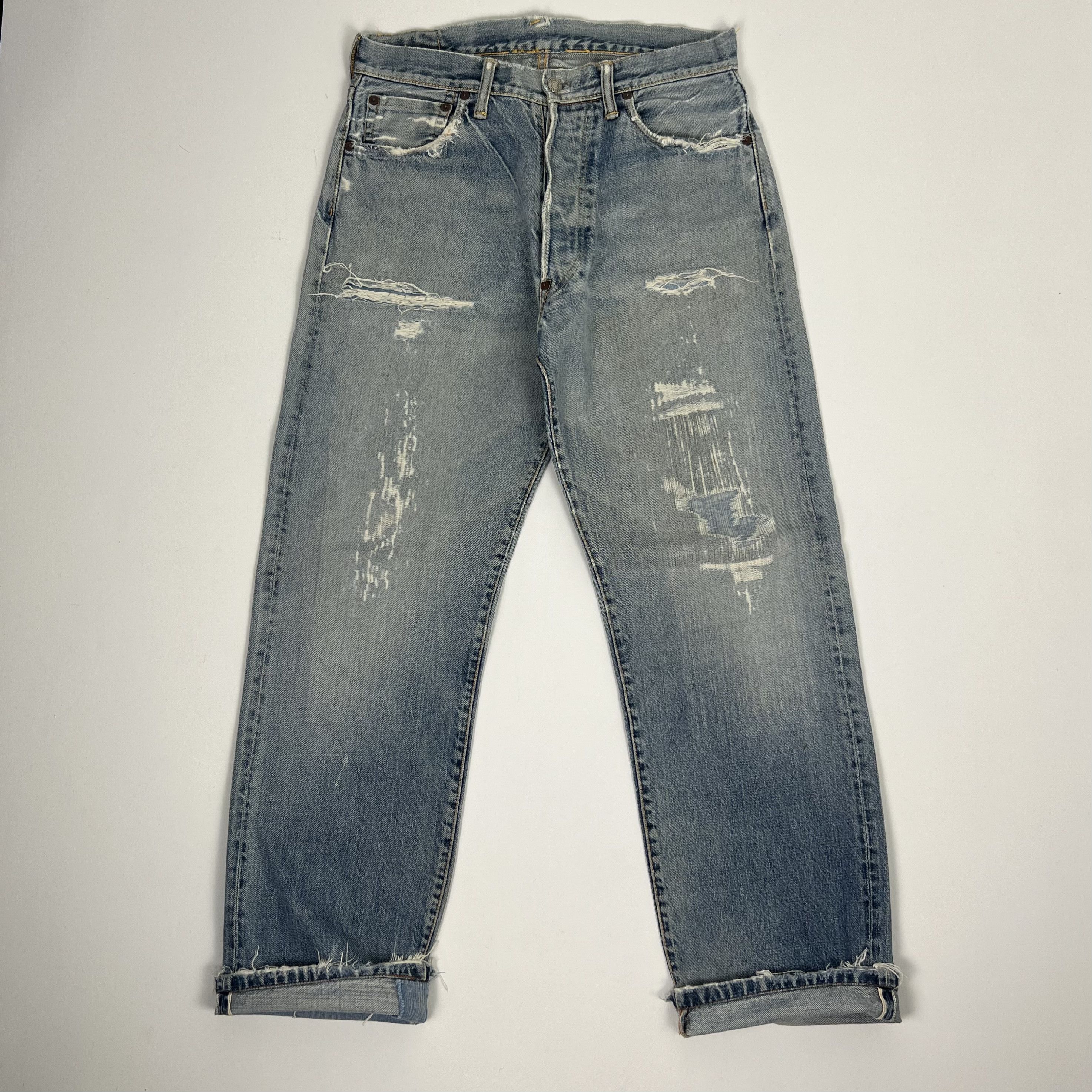 image of Vintage Evis Distressed Boro Jeans Hidden Rivet Trousers in Light Wash, Men's (Size 31)