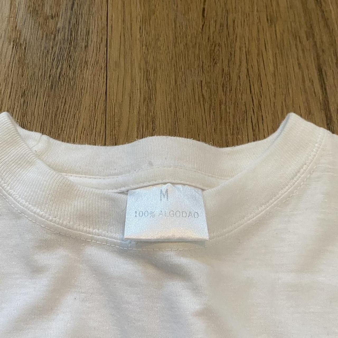 Other 1990s white nature graphic tee with red accents Size US M / EU 48-50 / 2 - 4 Thumbnail