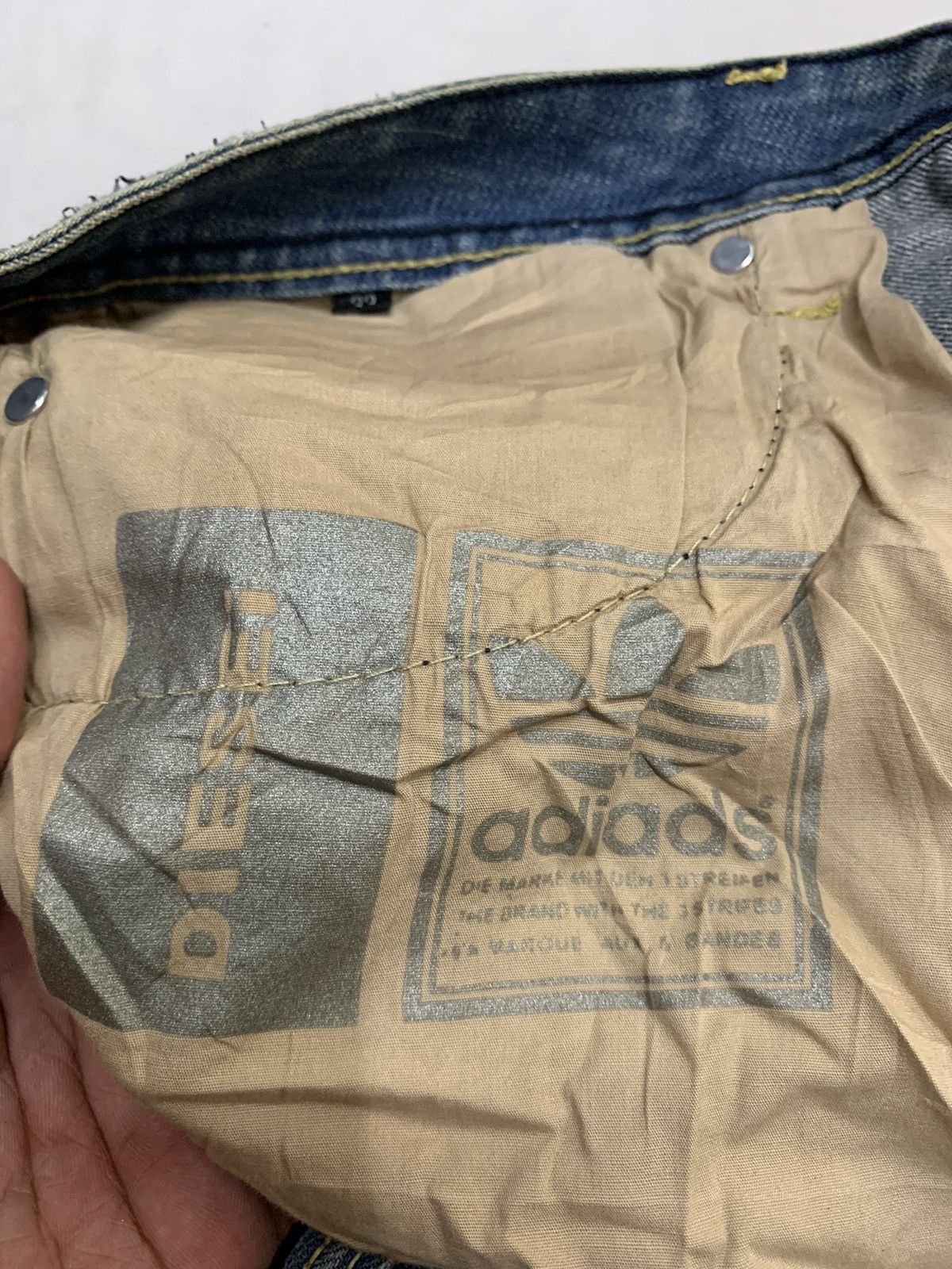?DIESEL X ADIDAS DISTRESSED DENIM W34