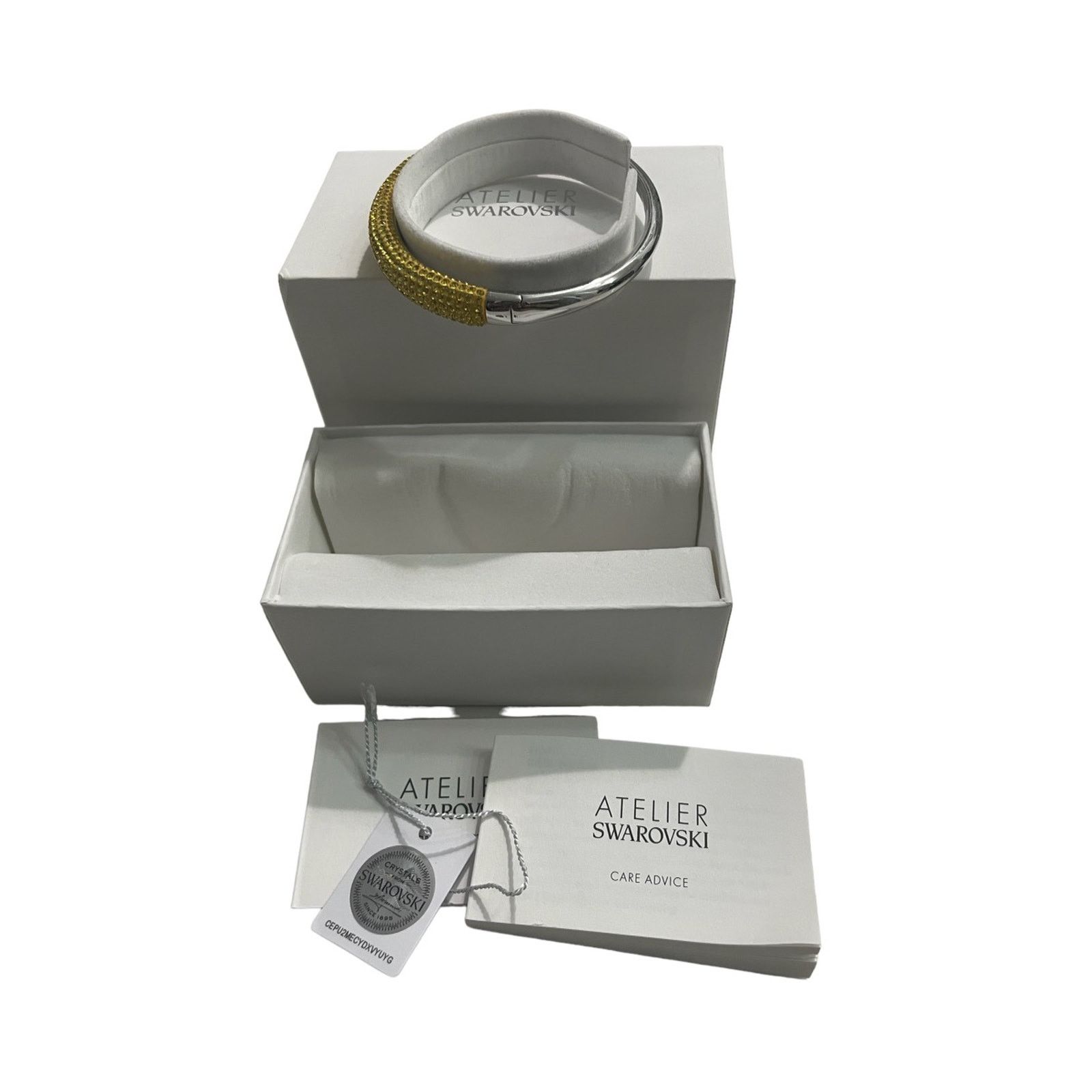 Swarovski Atelier Tigris bangle Yellow, Rhodium plated L