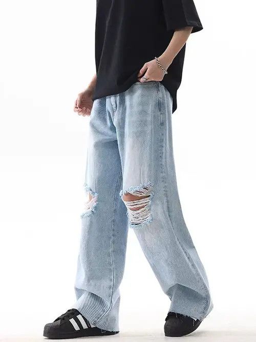 vintage light blue ripped washed loose jeans