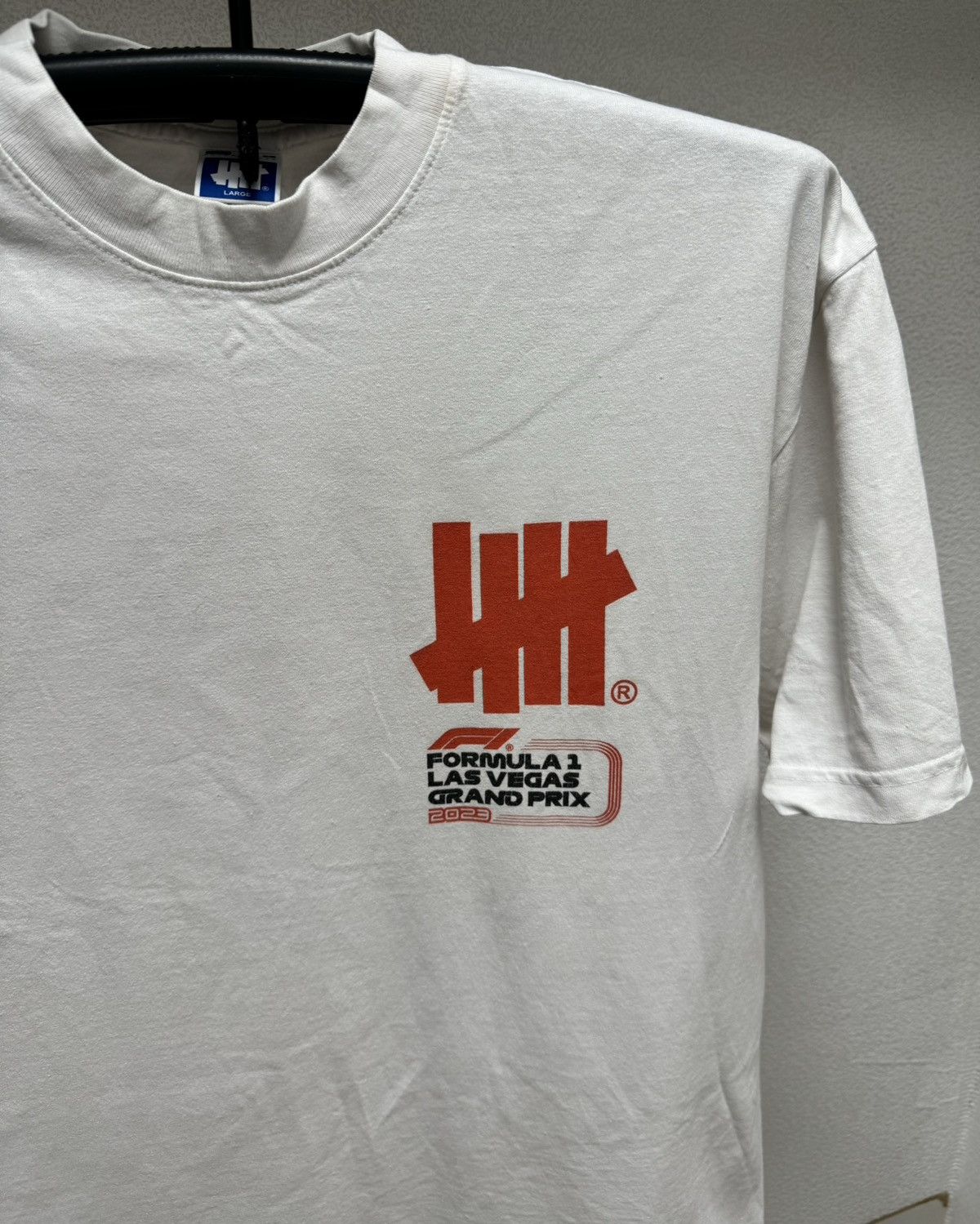 Undefeated Undefeated Formula 1 big logo white t-ahirt L sz UNDFTD las Size US L / EU 52-54 / 3 - 6 Thumbnail