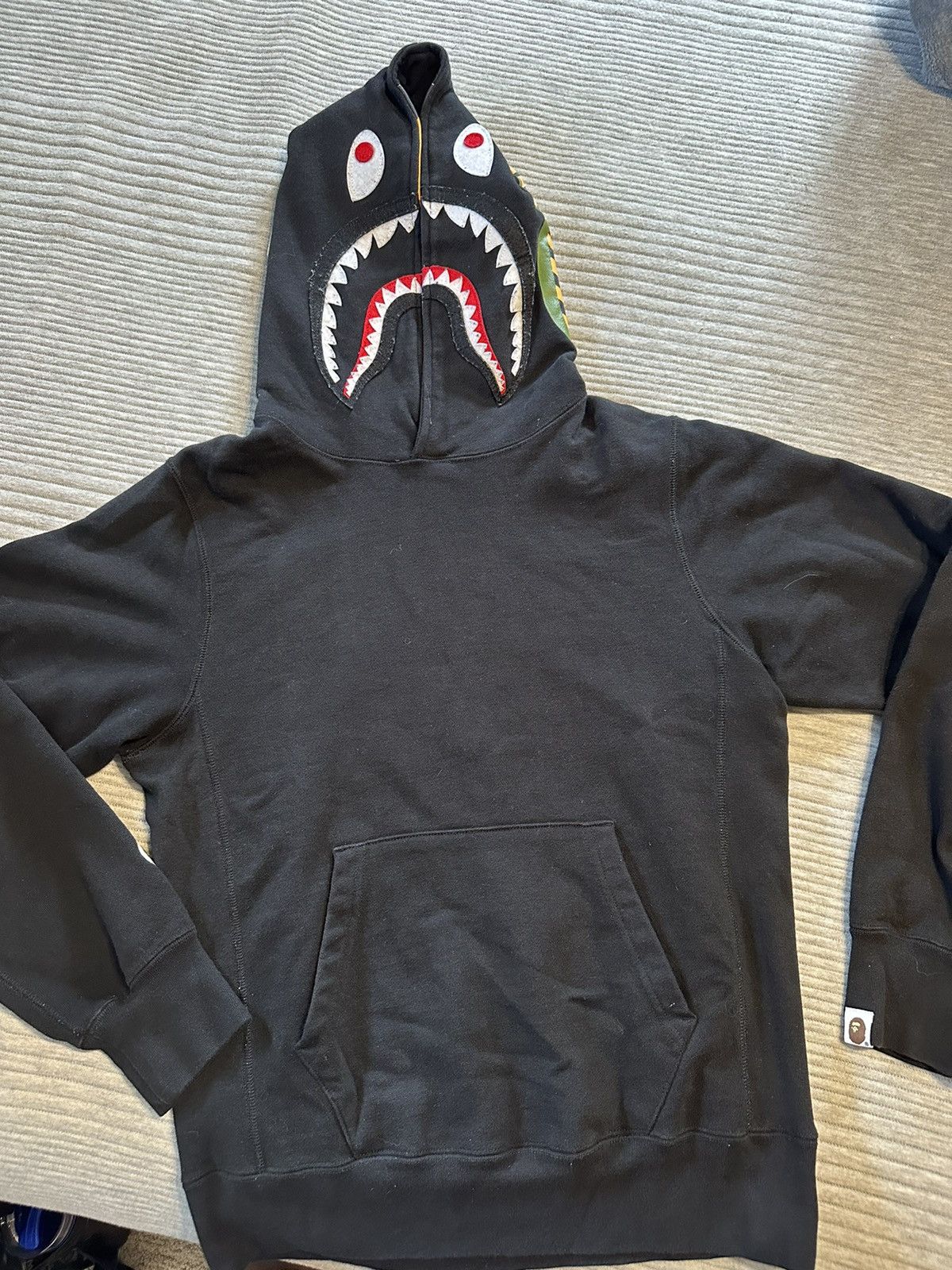 Bape shark emblem pullover best sale hoodie black