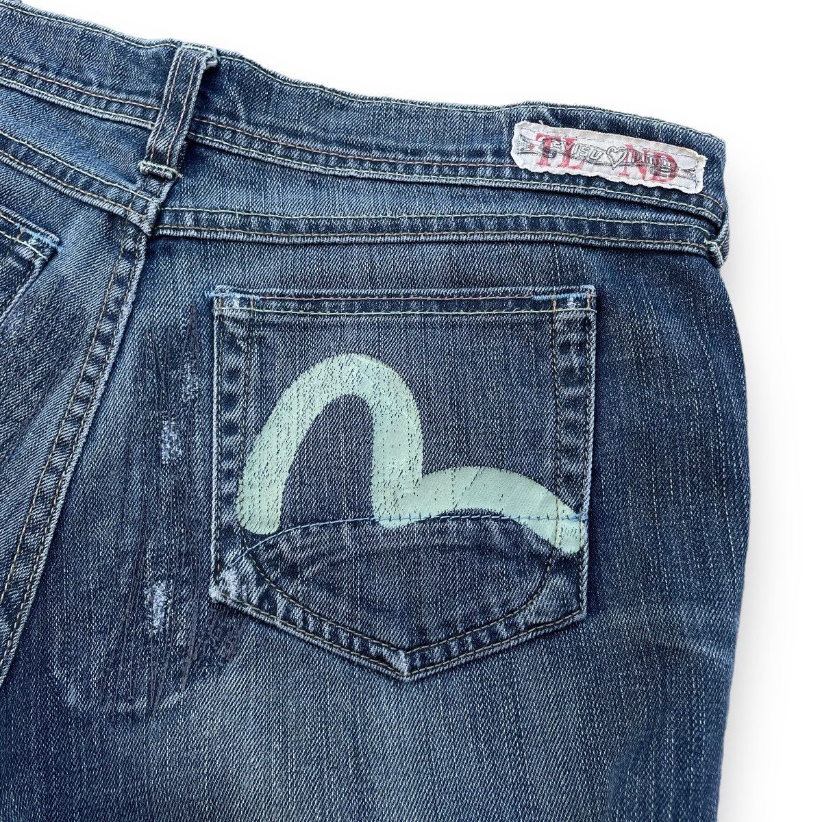 VINTAGE Y2K EVISU X PUMA DISTRESSED WASHED DENIM PANTS