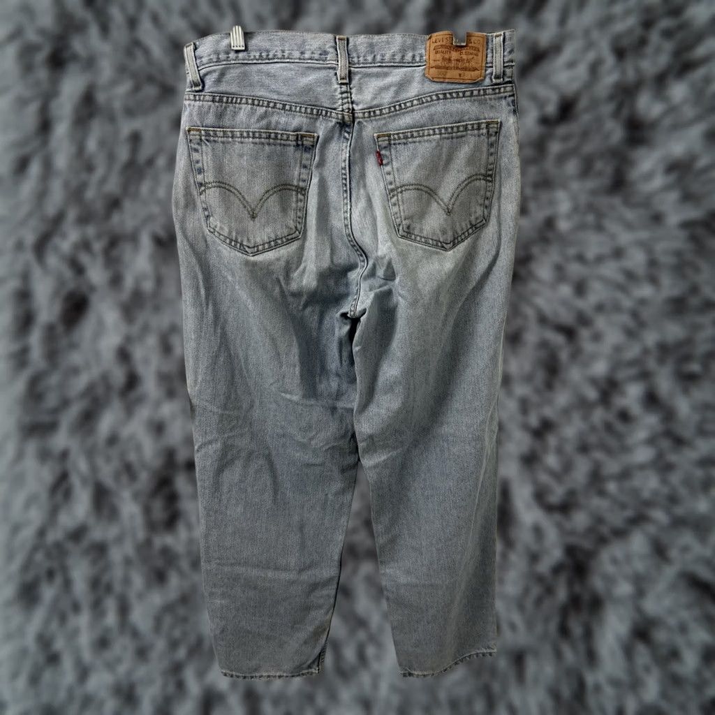 Levi's VINTAGE Levi's 560 Comfort Fit Jeans Mens 33x31 Light Blue Tapered Leg Denim Jeans 560 Levi's Men blue light wash 560s Mens Jeans Size US 33 - 1 Thumbnail